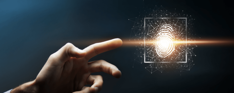 FAR and FRR in biometric security - graphic of fingerprint scan approached by outstretched hand on dark background