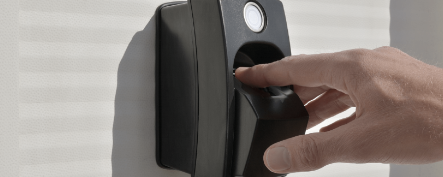 FAR and FRR in biometric security - ievo fingerprint reader outside in bright sunlight with outstretched hand