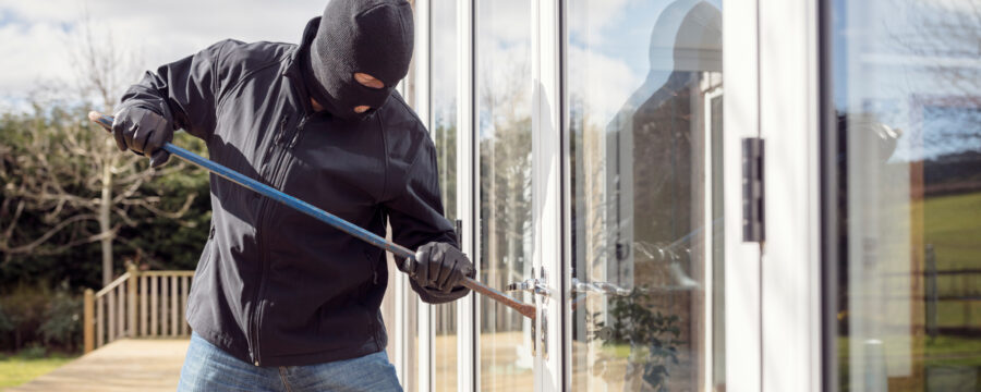 Broken window theory | Intruder breaking into a house